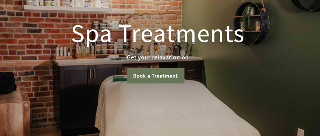 A serene spa setting adorned with spring blossoms, embodying tranquility and rejuvenation at Pure Organic Spa in downtown Cornwall.